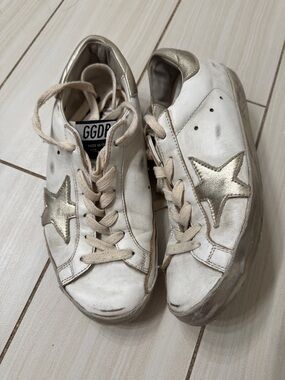 Golden Goose White Sneakers with Gold Star Detail
